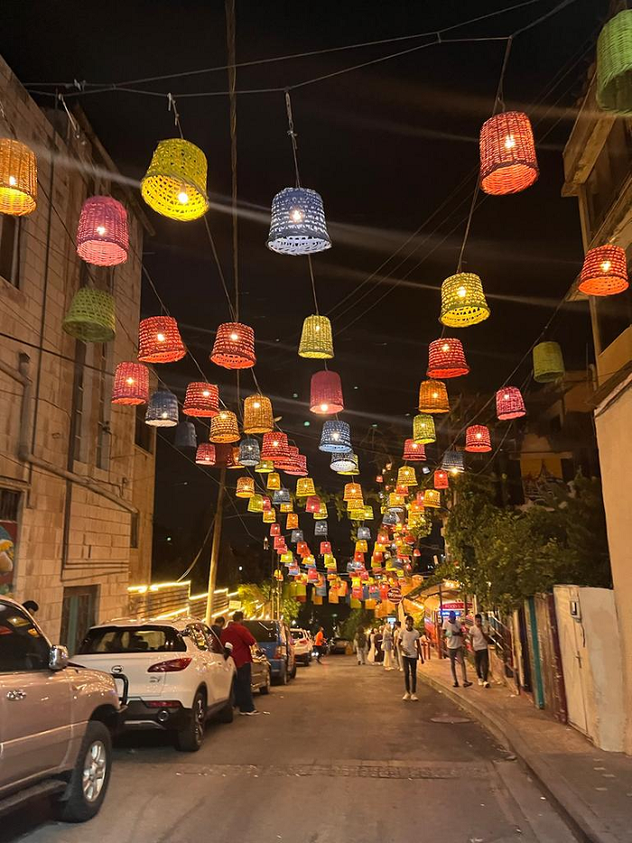 rainbow lanterns hanging over the street
