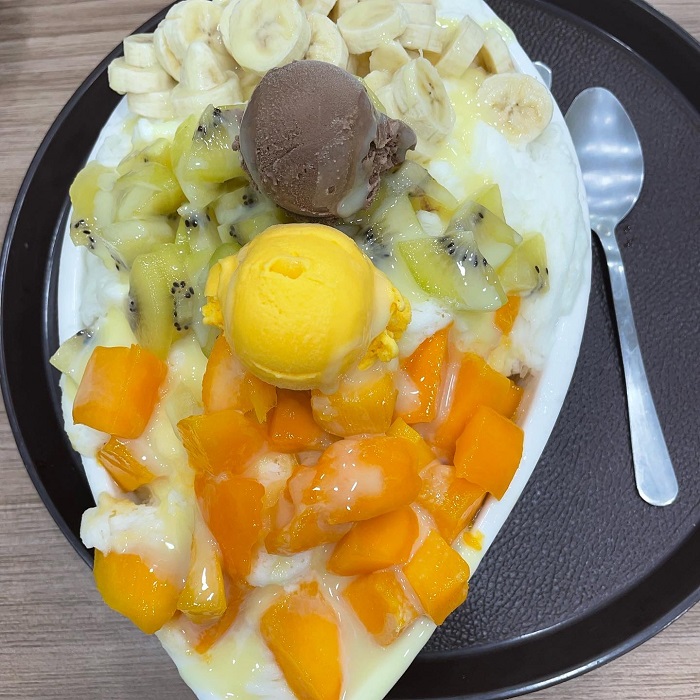 shaved ice topped with fruit 