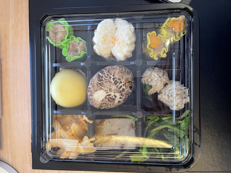 plastic tray with various foods