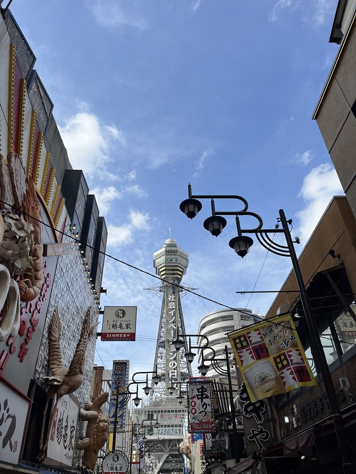 Street View of Tsutenkaku with signs and buildings 