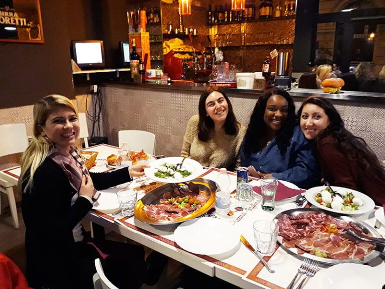 CET Florence study abroad students eat dinner at a restaurant in Florence