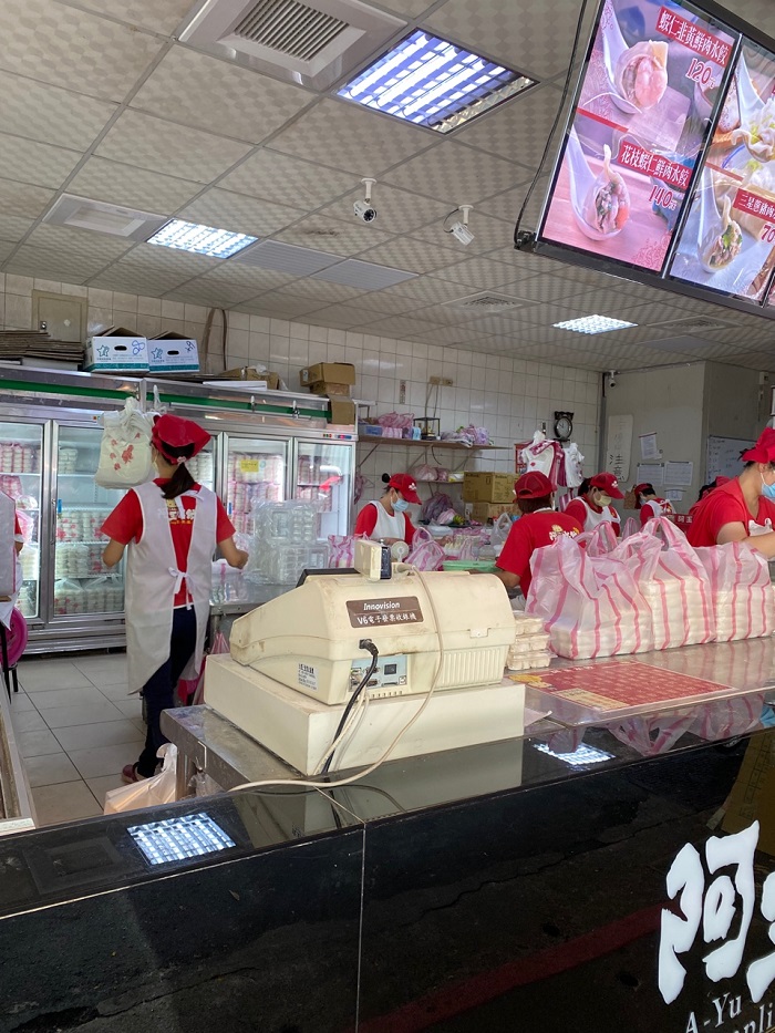 Restaurant employees behind a counter