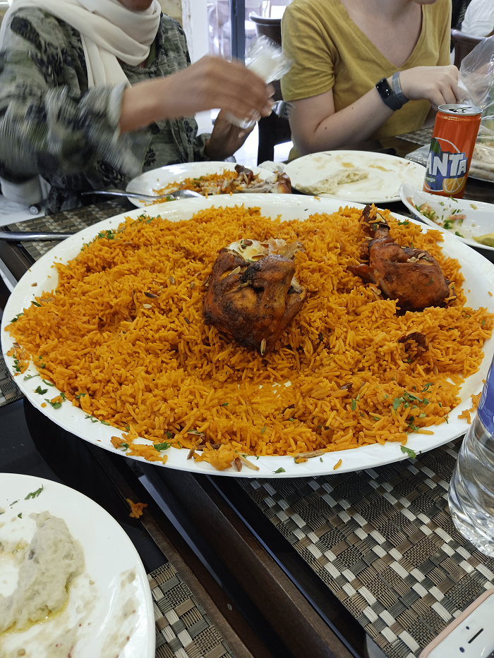 big plate of rice and chicken