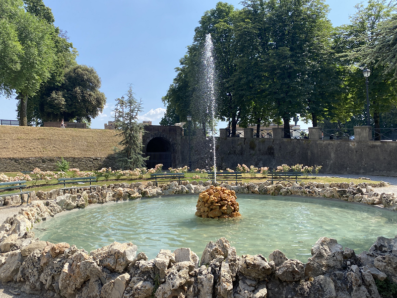 fountain with golden rocks in the middle