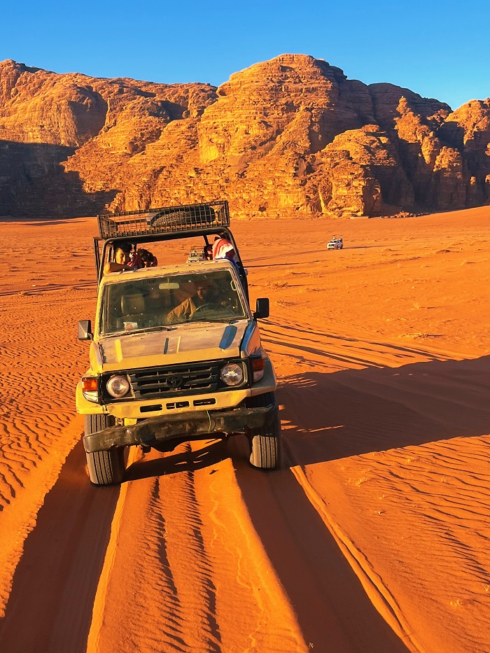 Truck riding through the desert