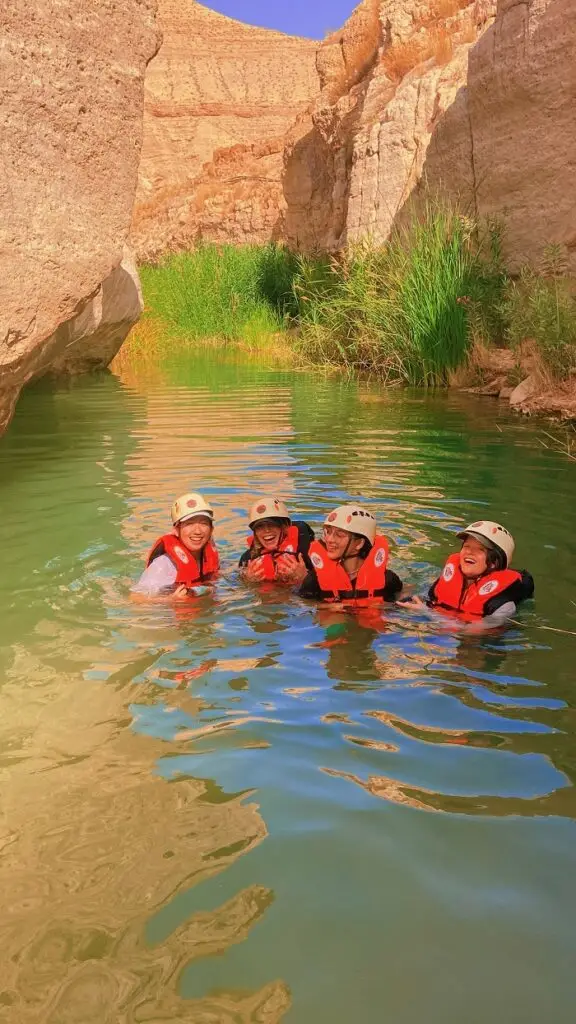 Grace and friends in river