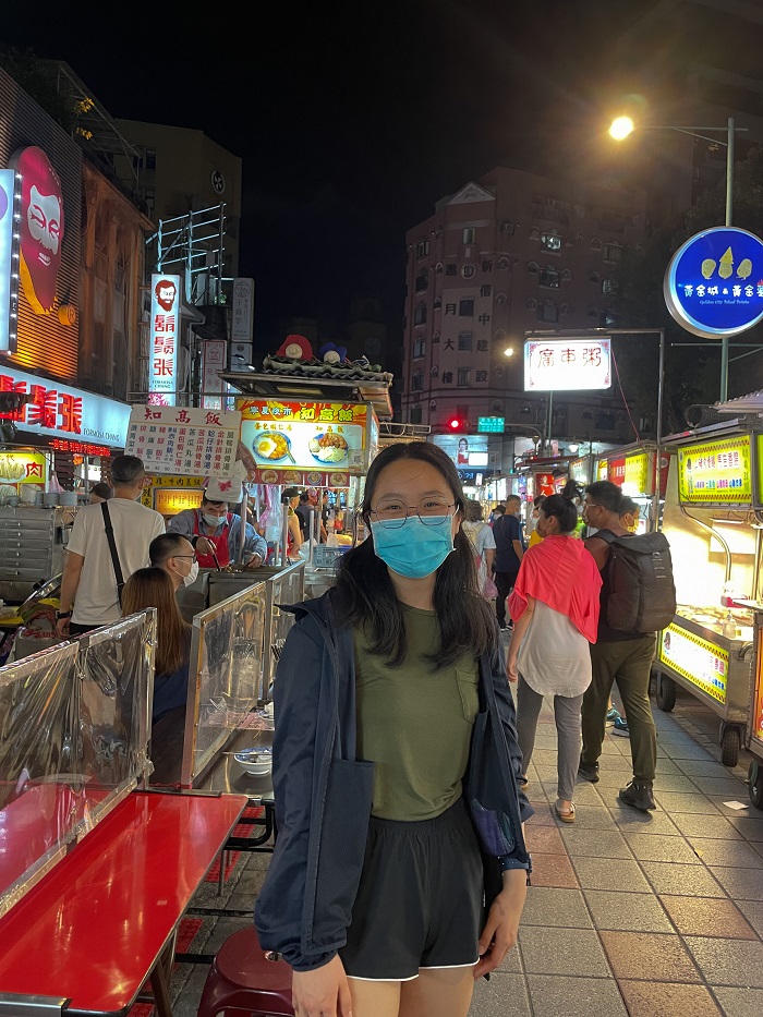 Wendy standing in Night market