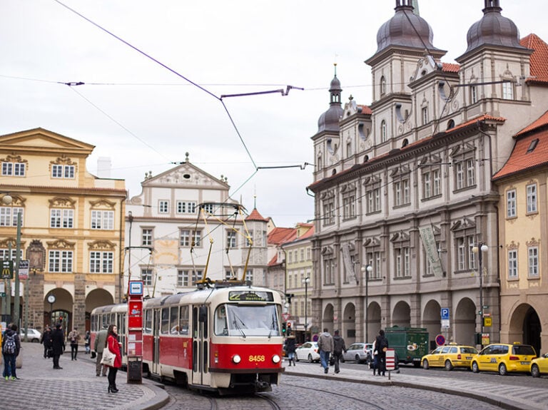 A tram in Prague goes through the old city