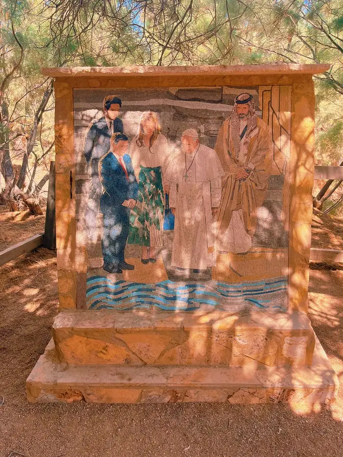 Art of the pope on a stone slab outside