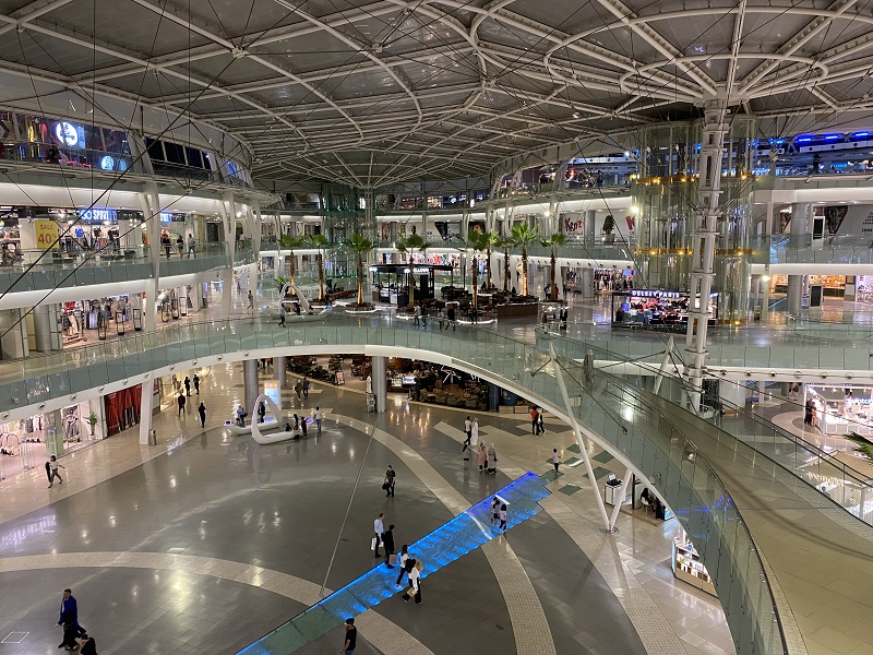 Inside view of Abdali Mall with shoppers and open shops