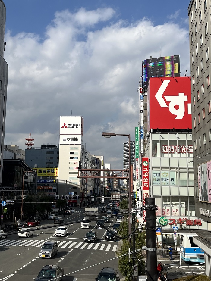 Street view in Umeda with vibrant store signs