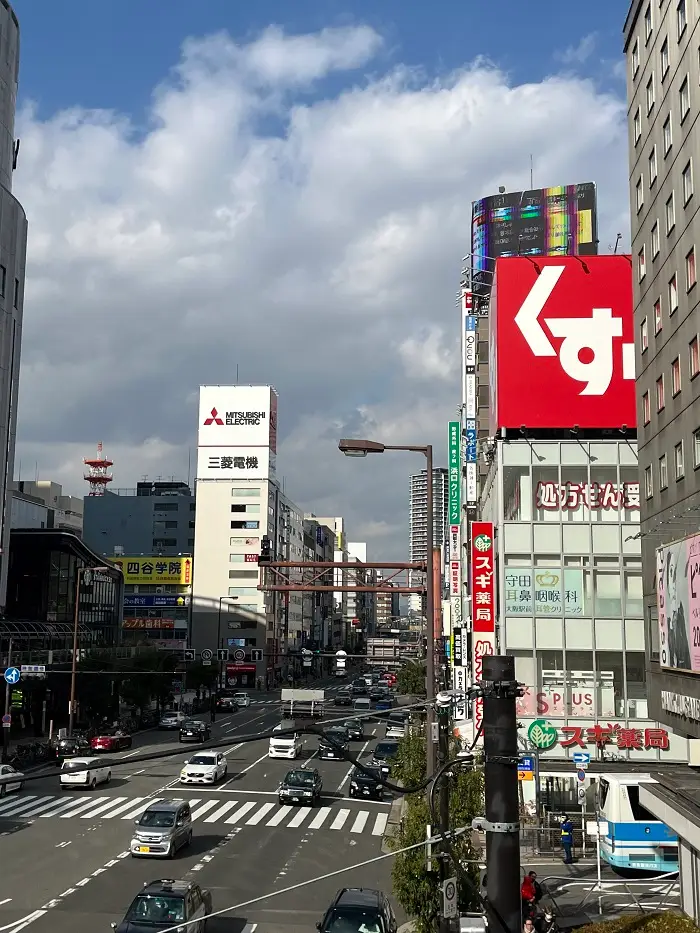 Street view in Umeda with vibrant store signs