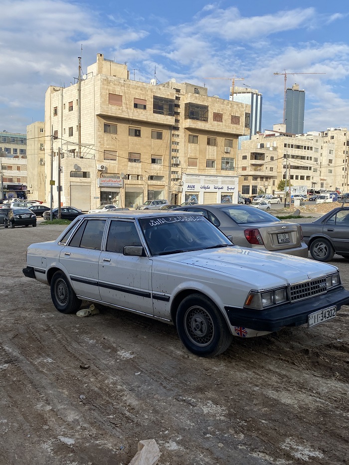 A parking lot with cars in Sweifiyeh in Amman, Jordan
