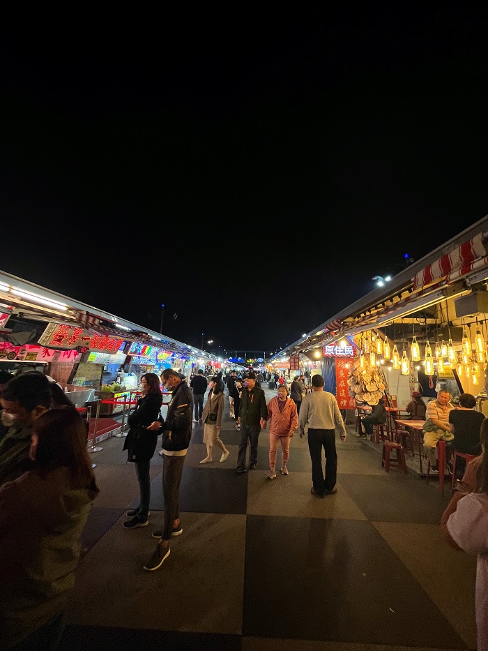 People roaming about Dongdamen night market in Taiwan