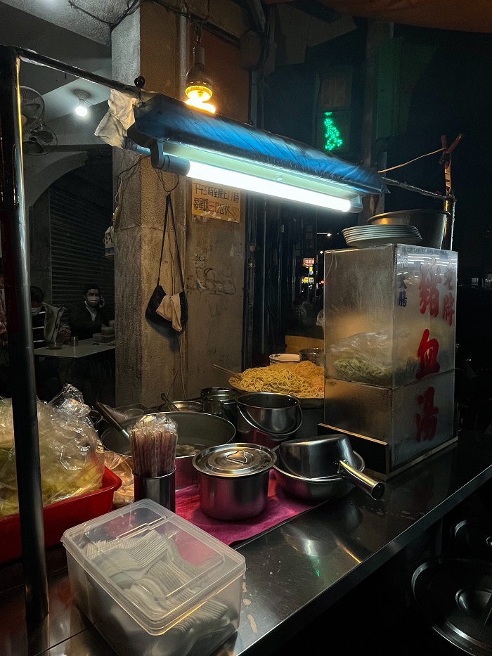 A noodle food stand at night in Taiwan
