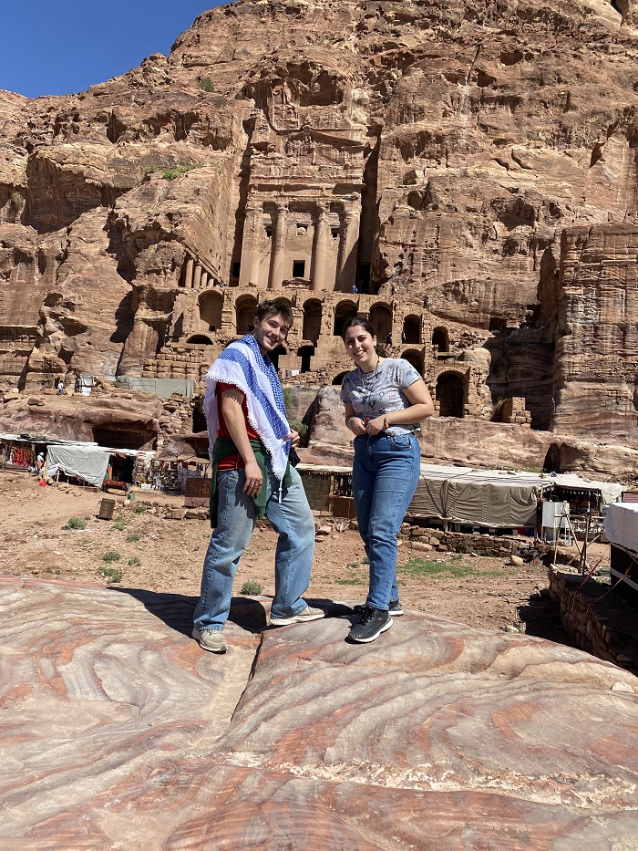 A CET Jordan student and a new Jordanian friend in front of Petra