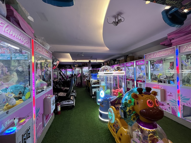 An empty room of claw machines and other arcade games  in Taiwan