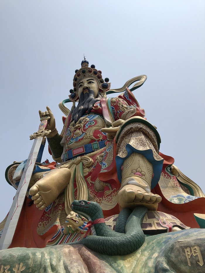 A giant statue of a Taoist god guarding the Lotus Lake in Kaohsiung, Taiwan