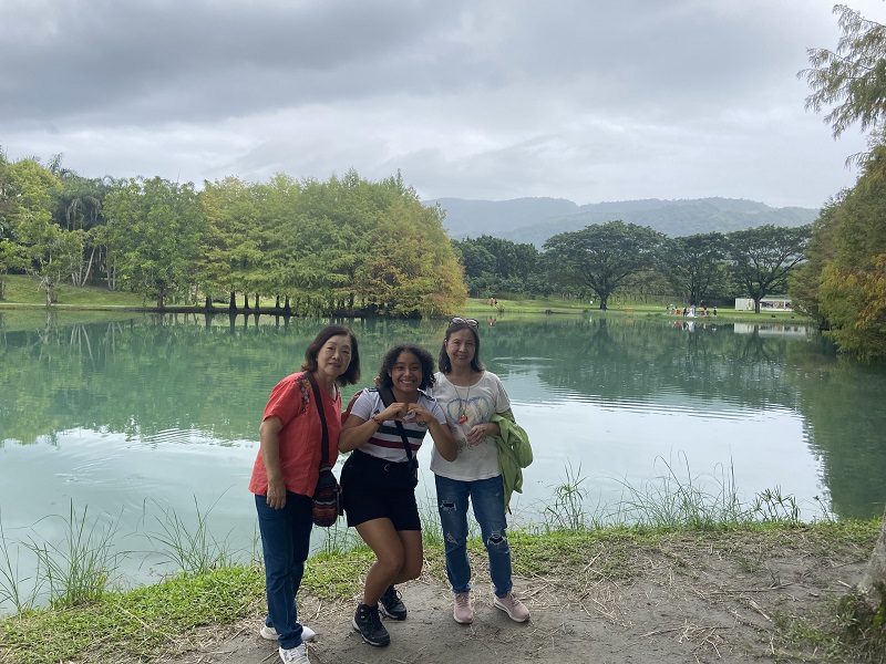 A CET Taiwan student and two other locals from Taiwan in front of the large pond at Taroko National Park Visitor Center 