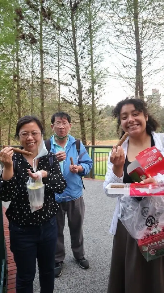 A CET Taiwan student smiling outdoors in Taichung with her language partner's parents