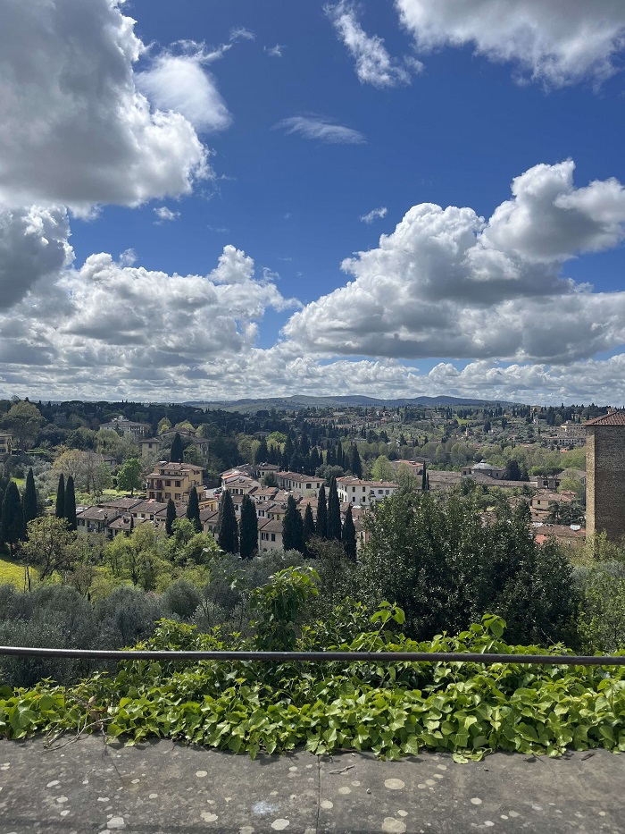 A view of the Boboli Gardens and partly cloudy skies in Florence