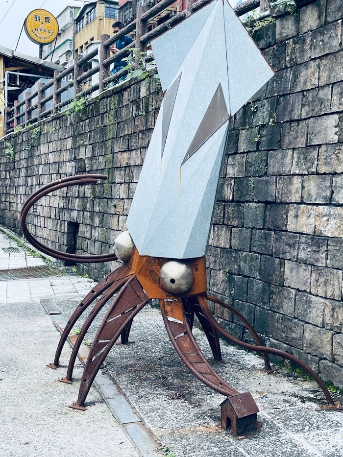 A squid sculpture outside near the Zhengbin Fishing Harbor