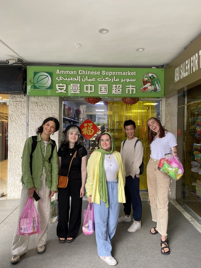 Five CET Jordan students standing outside of Amman Chinese Supermarket 