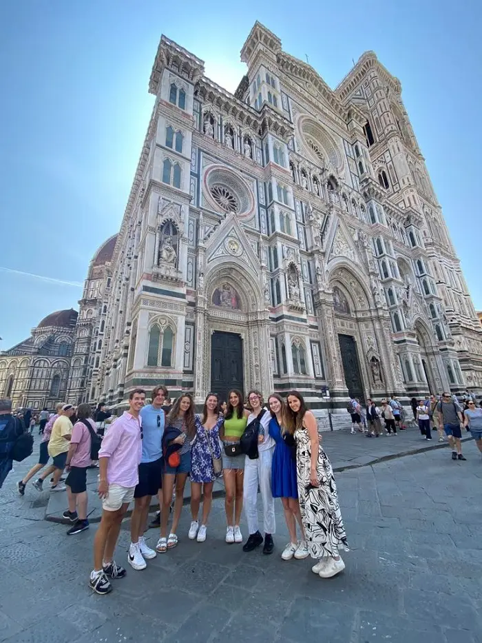 A group of CET Siena students and neighbors standing in front of the Duomo in Florence, Italy