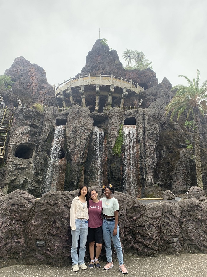 Three CET Taiwan students posing in front of an attraction in Leofoo Theme Park in Taiwan