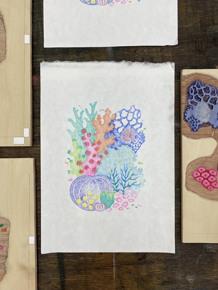 A coral reef artwork in a woodblock printing class by a AICAD in Japan student