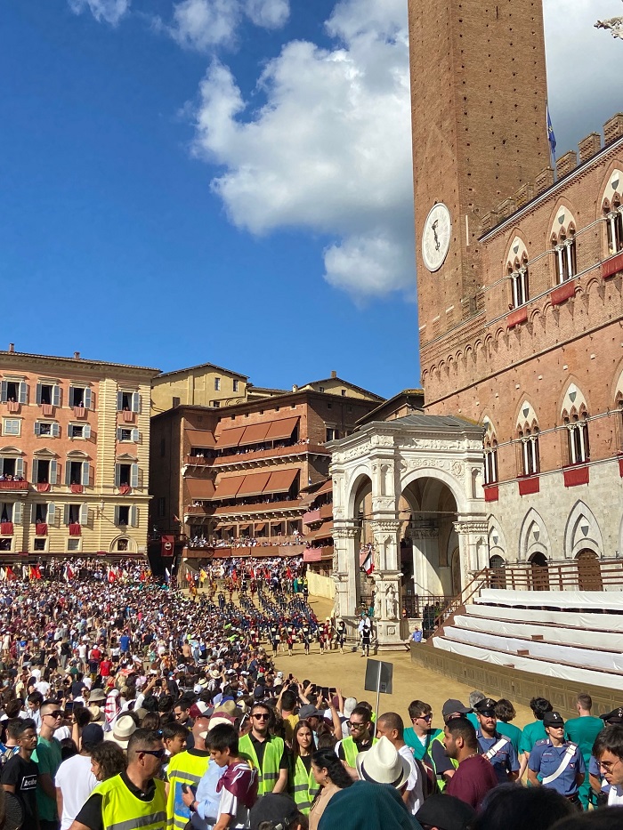 Many people packed within Piazza del Campo for the summer 2023 Palio race