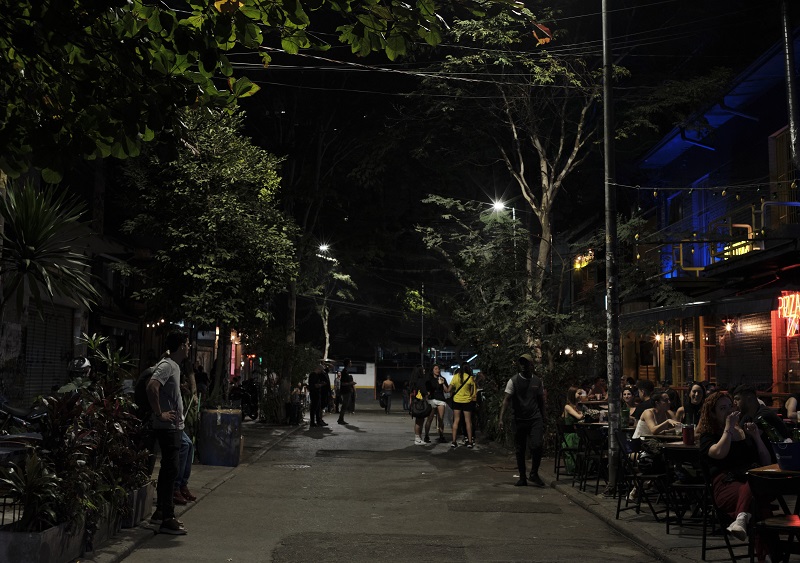 A dark street fully dedicated to bars and restaurants in Brazil