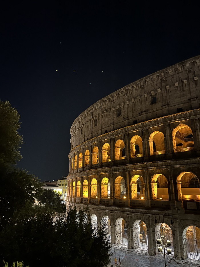 The Colosseum at night in Rome, Italy