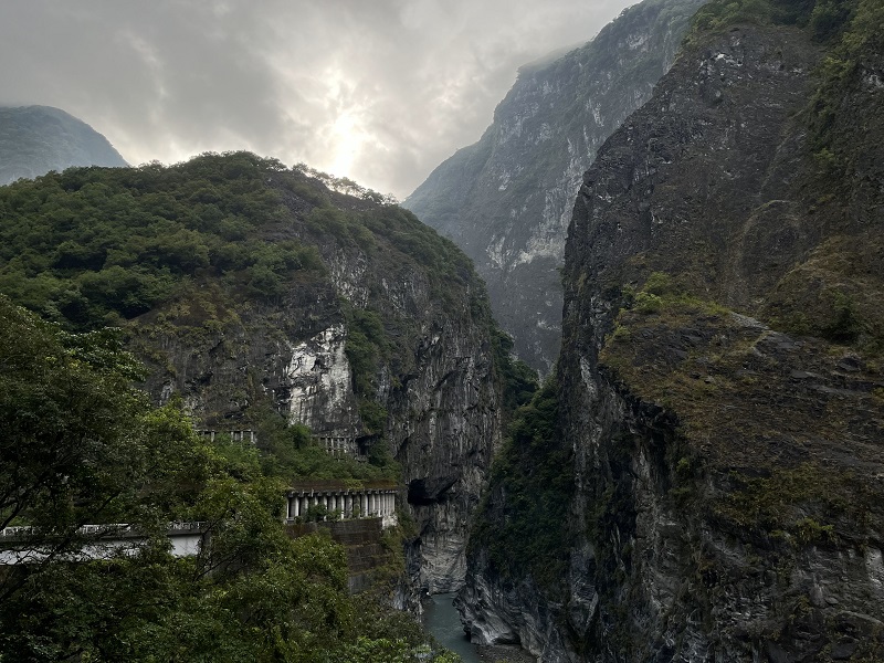 A stream running between the large and rocky rounded mountains at Taroko Gorge in Taiwan