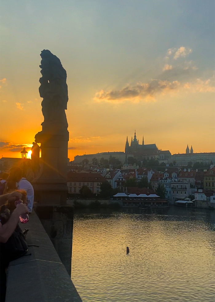 A view of the town from the Charles Bridge in Prague, Czech Republic during sunset