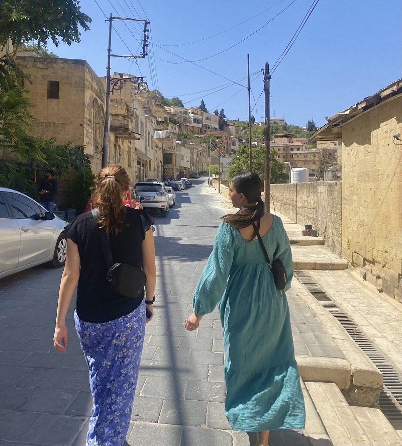 Two CET Jordan students walking through the scenic streets of As-Salt