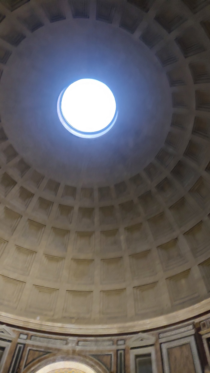 Blurry image of the oculus inside the Pantheon in Rome, Italy