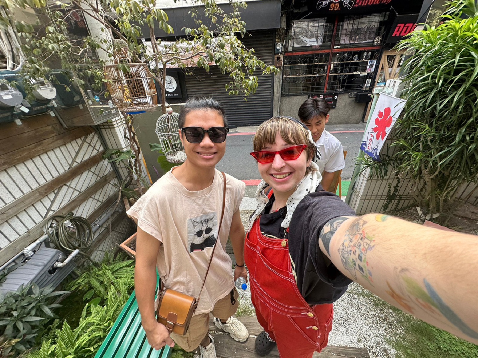 A CET Taiwan student and a local roommate taking a selfie outside