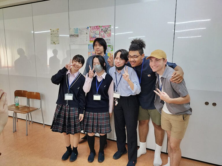 group of students hugging and smiling