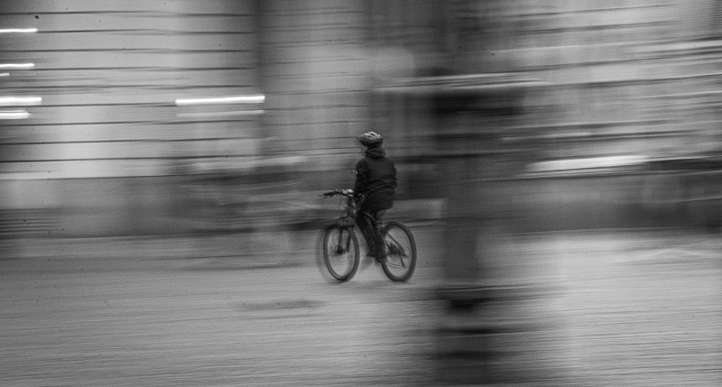 A person riding a bike in Prague