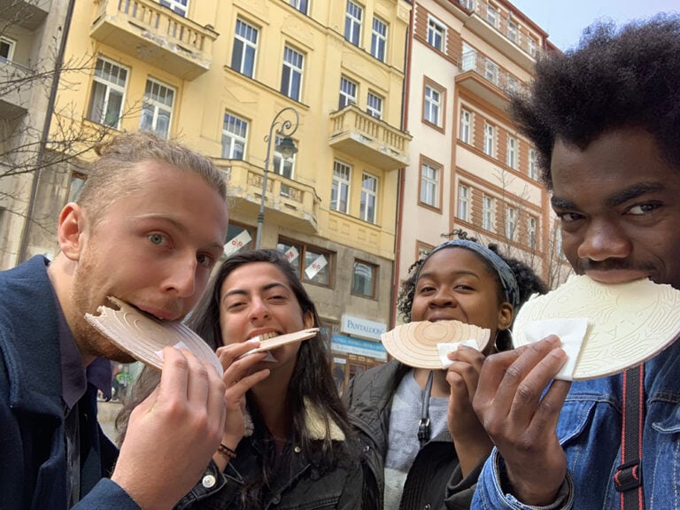 students eating on streets of Prague