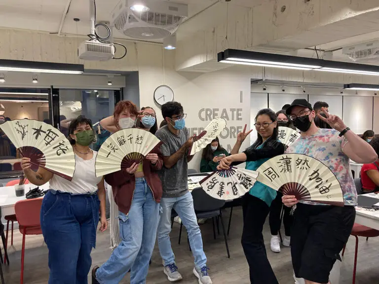 students in fan calligraphy class