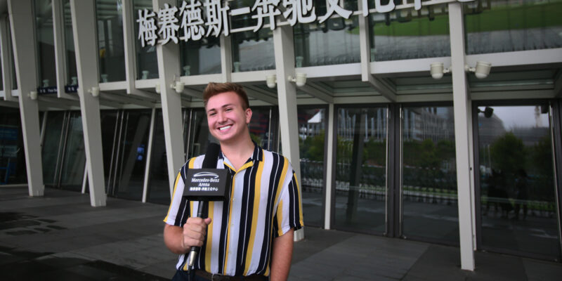 student holding microphone