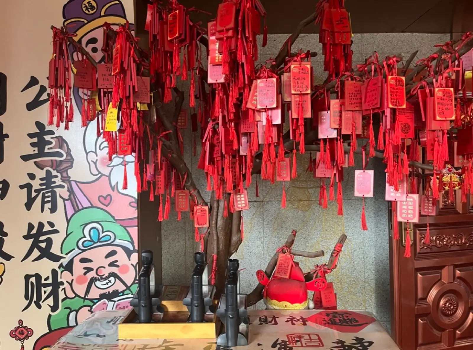 Wishing wall hung up on a tree