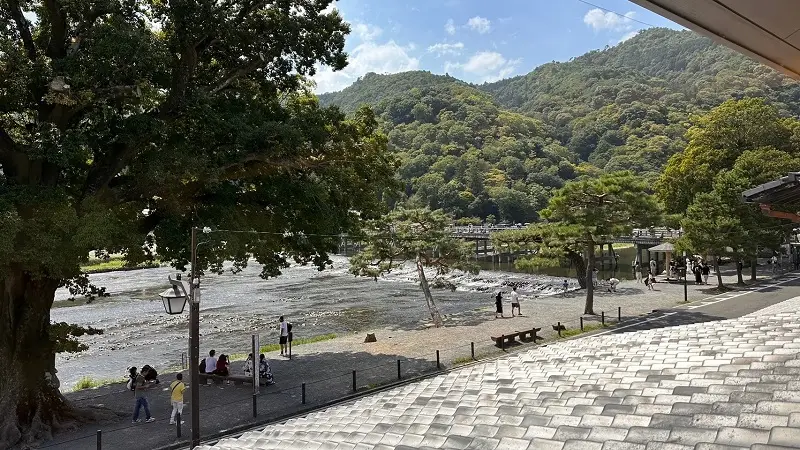A river with flowing water on a sunny day in Kyoto, Japan