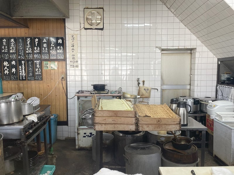 The view of an opened kitchen when sitting down at a local restaurant 