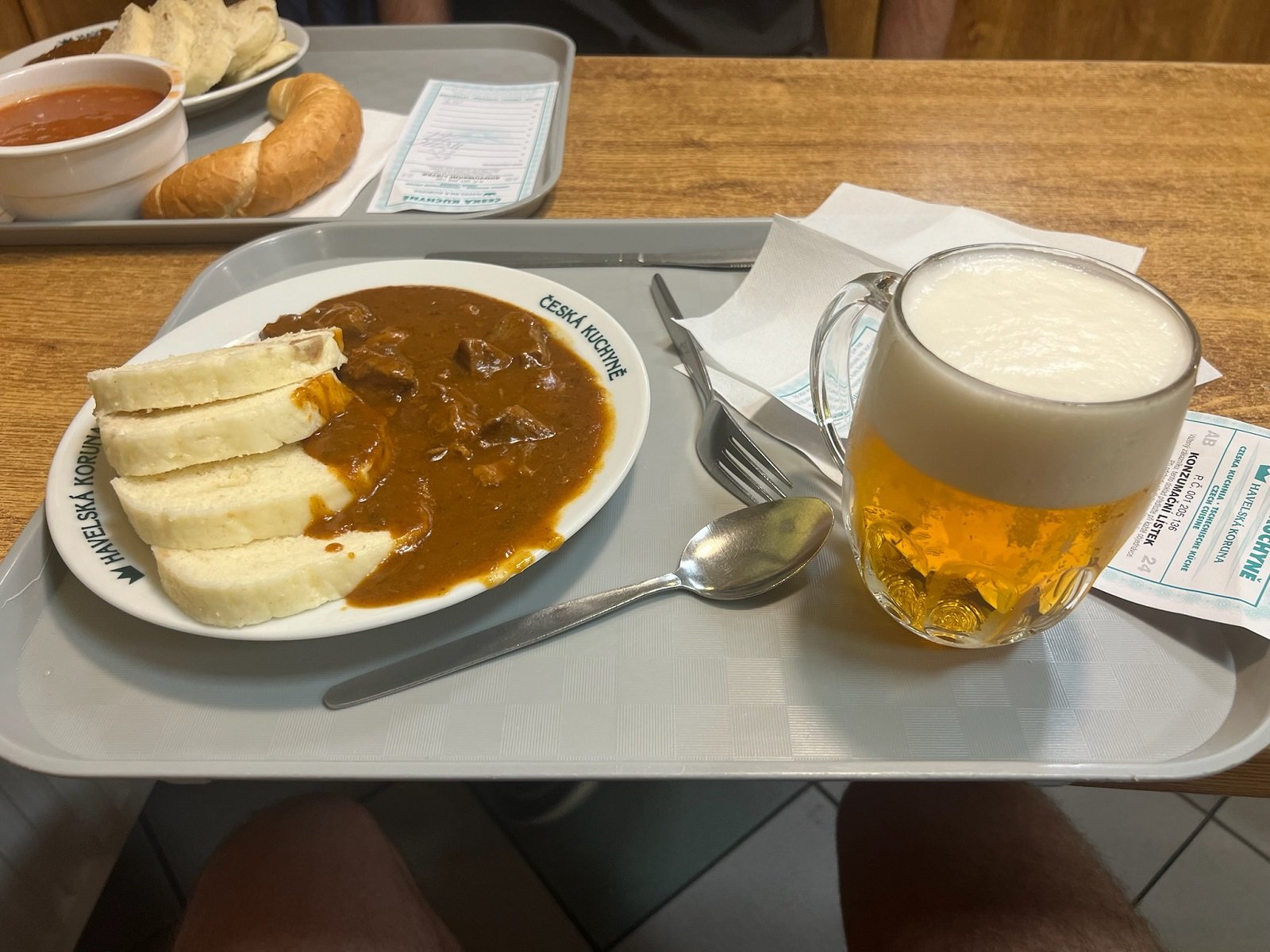 A sample of Czech specialties and seasonal foods on a tray including beer