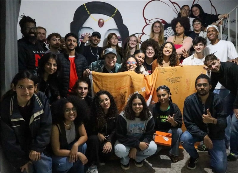 A group of students at an international student potluck organized by a student group called InGloba