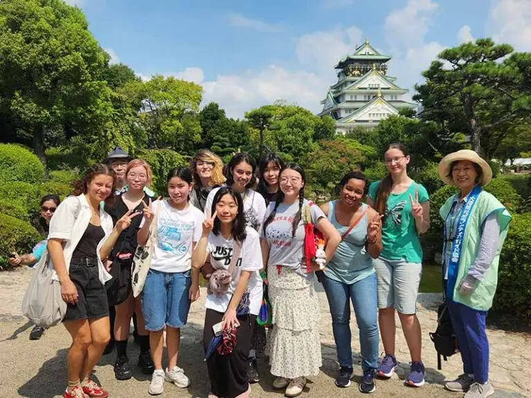 group outside of osaka castle