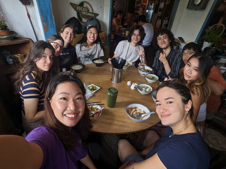 students and roommates at dinner